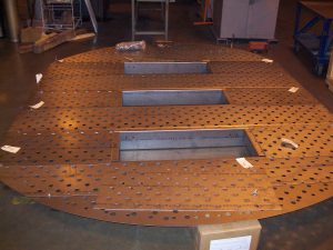 Trays being fabricated